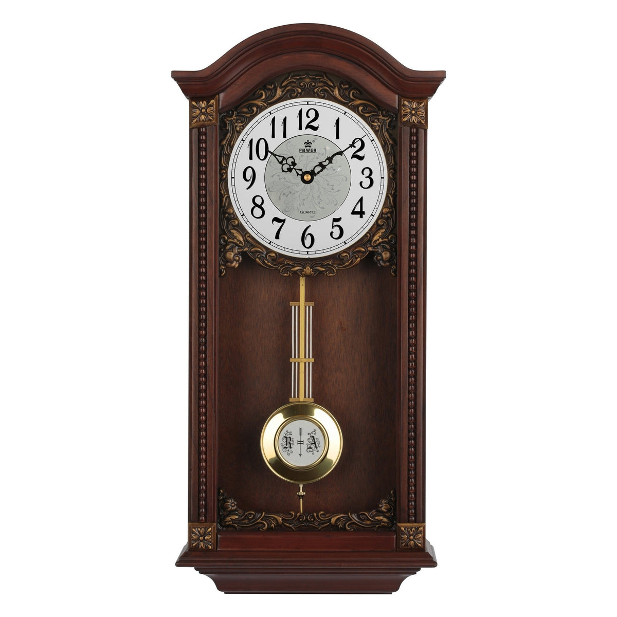 A traditional wooden mantel clock with a dark brown wood finish, ornate gold-toned scrollwork, a white clock face with black numerals, and a brass pendulum.