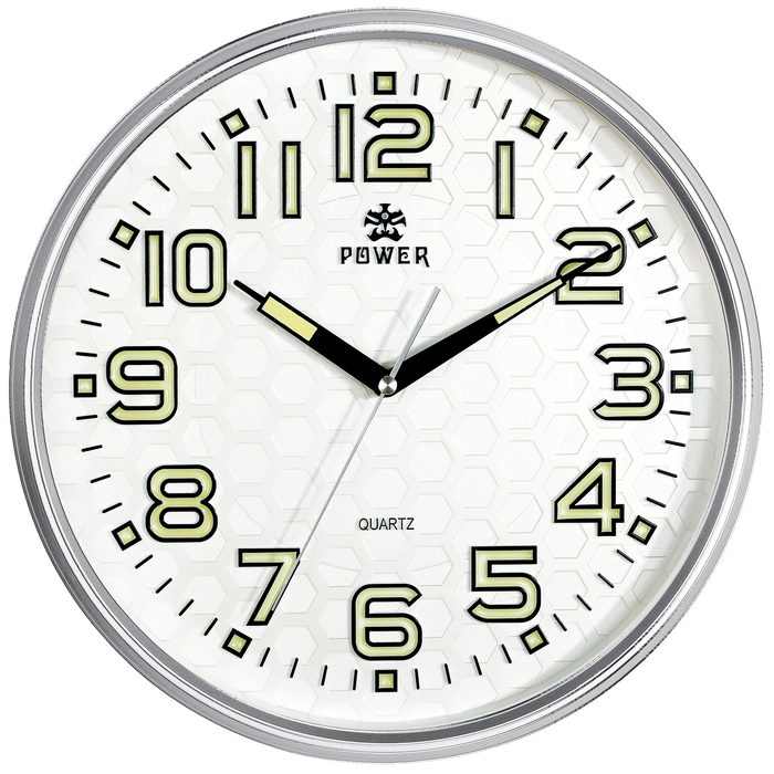 A round analog wall clock with a silver metal rim, a white face, and large glowing yellow numerals. The clock has black hands, a subtle honeycomb pattern on the dial, and the brand name 'POWER' printed above the 12.